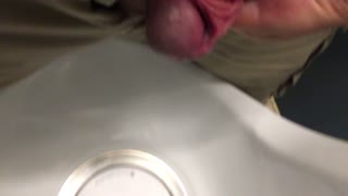 Pissing at work urinal, after completing meatotomy 