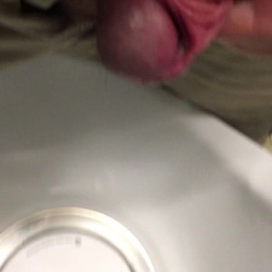 Pissing at work urinal, after completing meatotomy 
