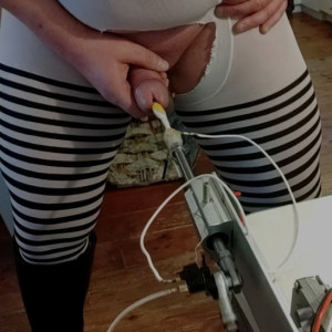 Toothbrush on a fucking-machine, fucks my clit hard and a switch gives a hard e-stim at the last centimeter, when it is complete inside me. Very hard to stand.